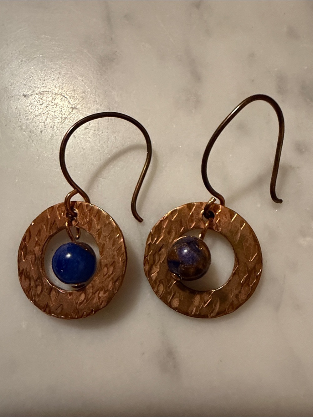 Handcrafted Copper Circle Earrings with Blue Stone Accent